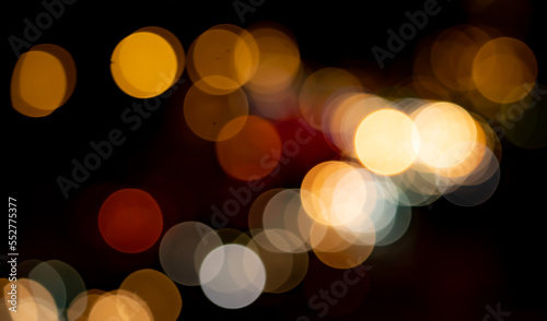 Abstract bokeh background, bright round lights. © Prikhodko