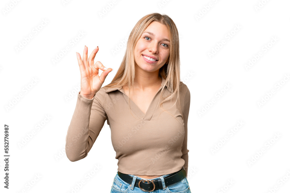 Young pretty blonde woman over isolated chroma key background showing ok sign with fingers Young pretty blonde woman over isolated chroma key background showing ok sign with fingers