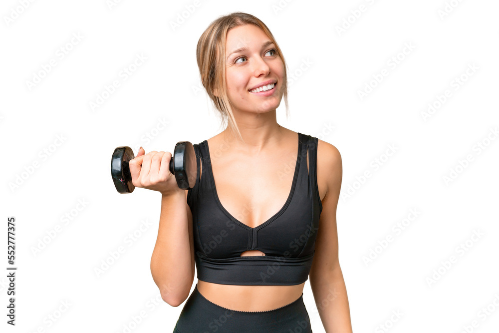 Blonde sport woman making weightlifting over isolated chroma key background looking up while smiling Blonde sport woman making weightlifting over isolated chroma key background looking up while smiling