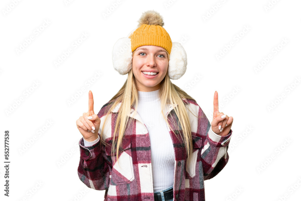 Young pretty blonde woman wearing winter muffs over isolated chroma key background pointing up a great idea Young pretty blonde woman wearing winter muffs over isolated chroma key background pointing up a great idea