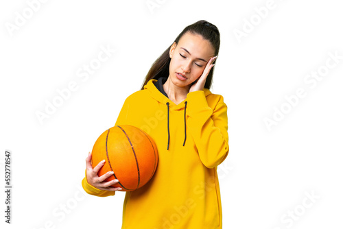 Young Arabian woman playing basketball over isolated wall  over isolated chroma key background with headache © luismolinero