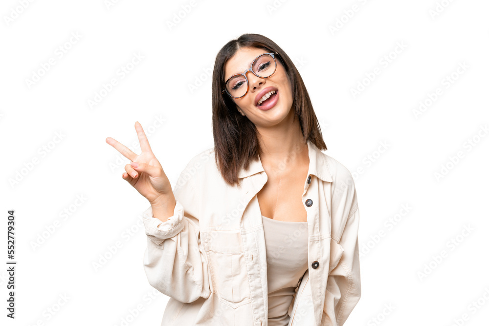 Young Russian woman over isolated chroma key background smiling and showing victory sign Young Russian woman over isolated chroma key background smiling and showing victory sign