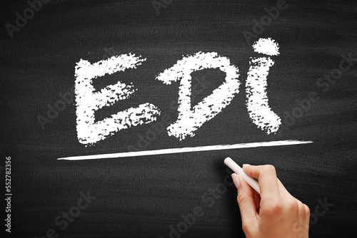 EDI Electronic Data Interchange - concept of businesses electronically communicating information that was traditionally communicated on paper, acronym text on blackboard photo