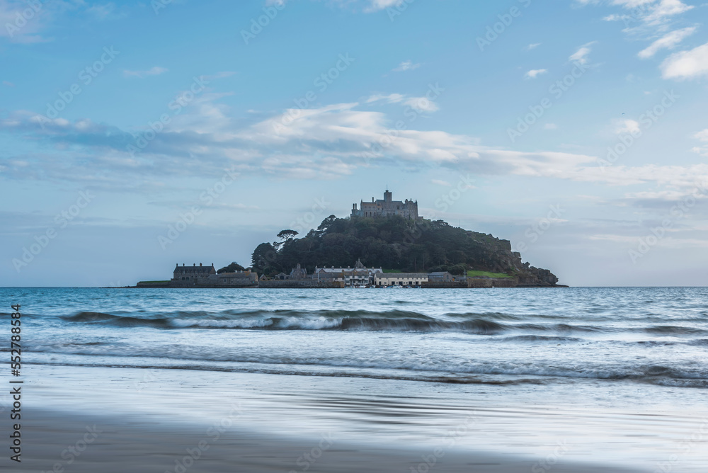 Lovely landscape image of St Michael's Mount in Cornwall England during soft pastel color sunset evening Lovely landscape image of St Michael's Mount in Cornwall England during soft pastel color sunset evening