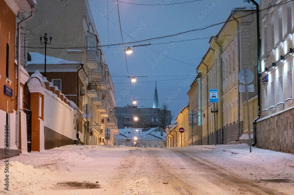 Moscow, Russia - December 7, 2022: Snow-covered streets and houses of cold and winter Moscow