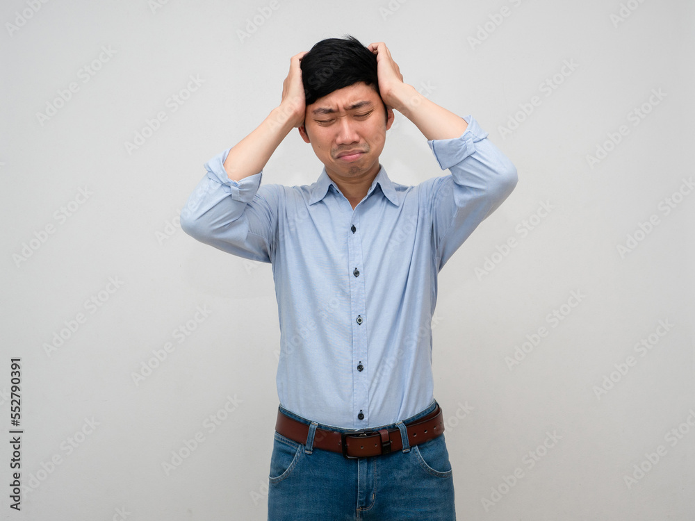 Businessman feels tried from working gesture hold his head isolated Businessman feels tried from working gesture hold his head isolated