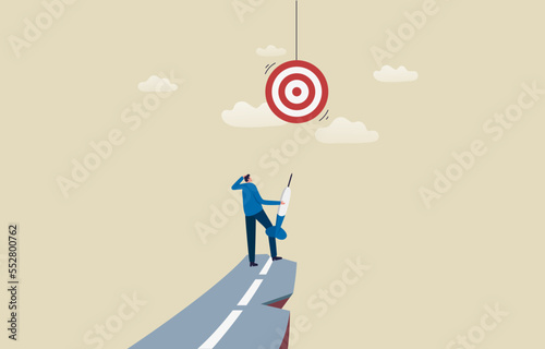 Focus on target. Overcome yourself and the challenge. Achieve business objective. .Businessman standing on the cliff and looking at the target in the sky. Illustration