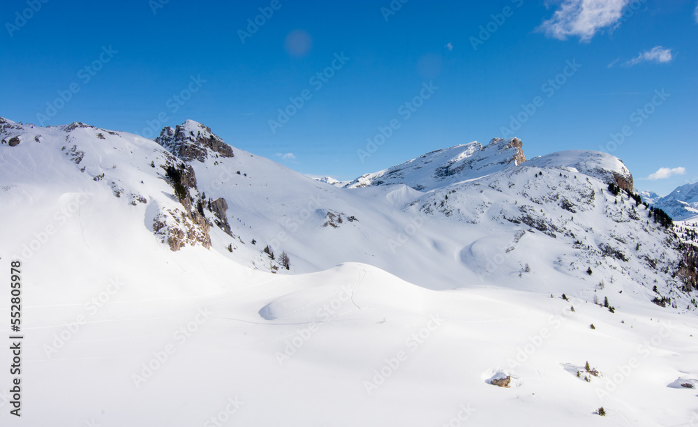 sunny day in the snowy Dolomites