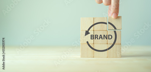 Rebranding strategy concept. Marketing and brand management. Rethinks marketing strategy with a new name, logo, or design, the intention of developing a new. Refreshing the look and feel of brand. photo