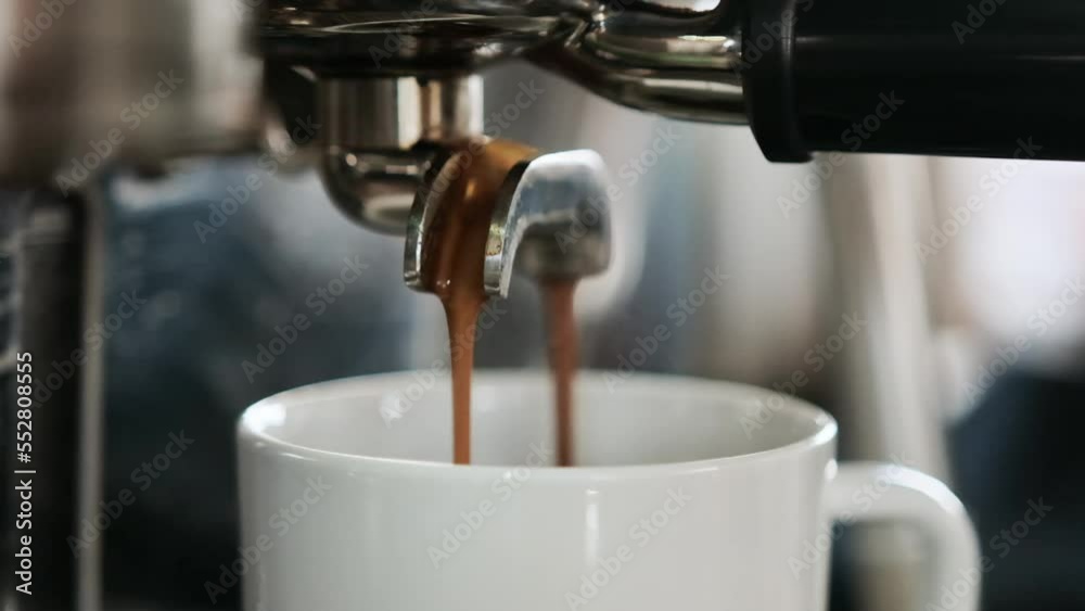 Coffeemaker machine fill cup with fresh coffee cappuccino. Profesional automatic cafe maker preparing hot beverage in mug closeup