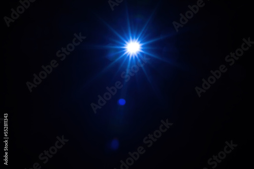 Light star illuminated on a black background.