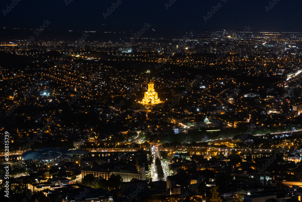 Top view of Tbilisi center and the Holy Trinity Cathedral at night