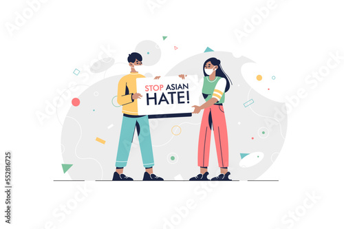 Stop Asian Hate‬‬. China protest. Hashtag to support asian community during the covid-19 pandemic. Stop racism. Man and woman wearing face mask and holding banner against bullying, hate and violence.