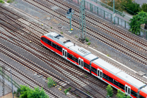 modern high speed intercity train carries passengers. Public transport and technology. Aerial view