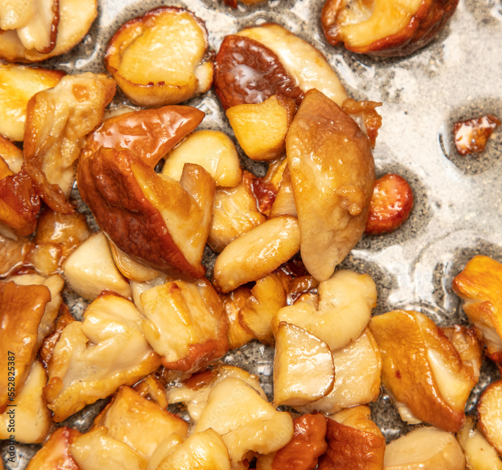 Fried mushrooms in oil in a frying pan. Fried mushrooms in oil in a frying pan.