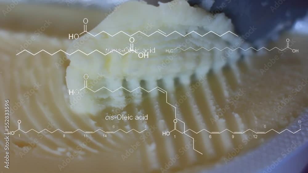 A knife spreading butter appear with a overlay of fatty acids and other ...