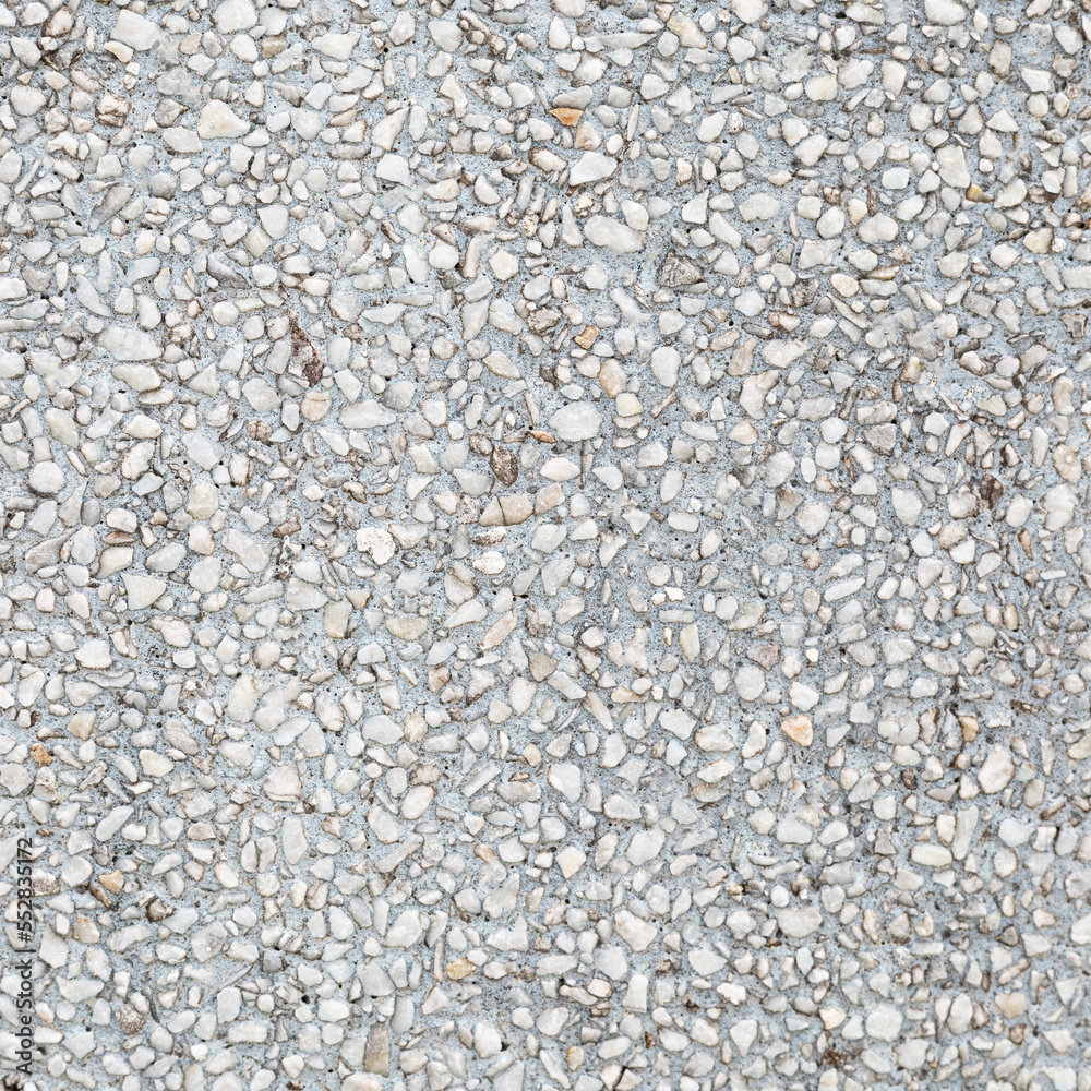 The pattern small bluish white pebbles stone as background. pebbles texture wall and floor. The pattern small bluish white pebbles stone as background. pebbles texture wall and floor.