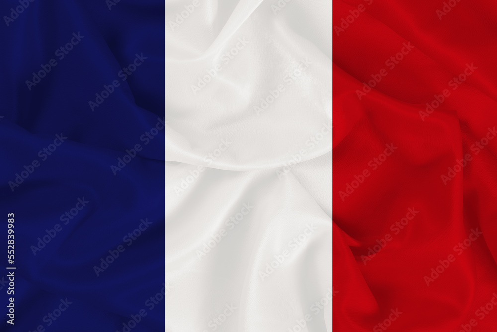 Flag of the European country of France. The national flag of France on wavy fabric background