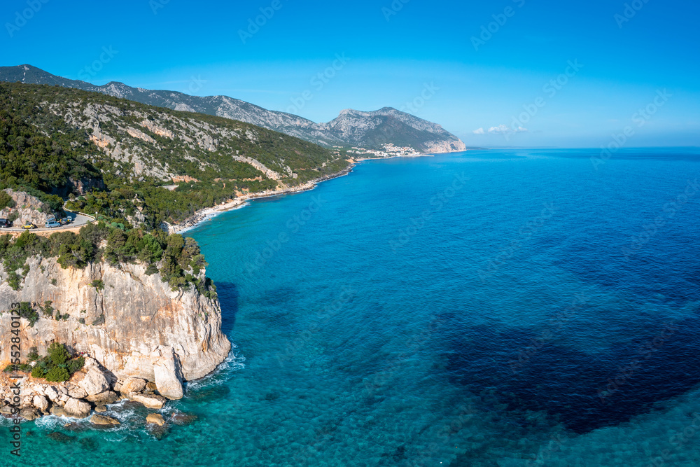 the rugged mountainous coast near Cala Gonone with turqouise water and small white sand beaches