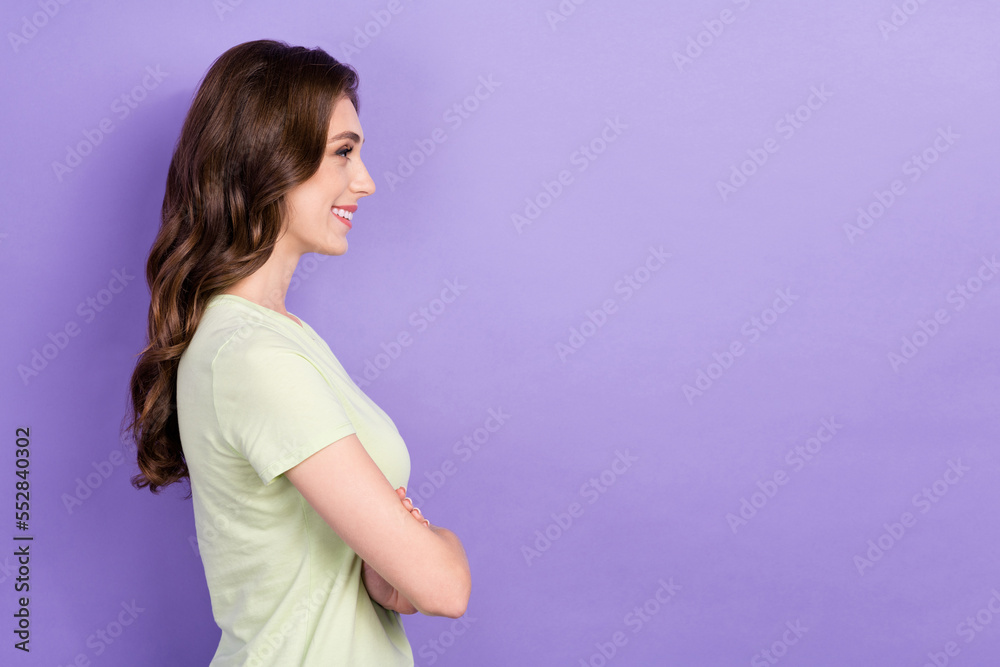 Profile photo of young optimist business woman boss curly hair folded hands look empty space good finance results isolated on violet color background Profile photo of young optimist business woman boss curly hair folded hands look empty space good finance results isolated on violet color background