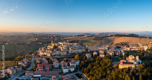 aerial panorama view of the village of Morrovalle in Marche Province in Italy in warm evening light