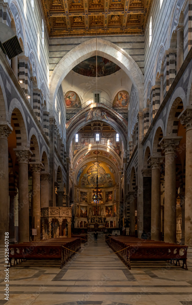 interior vie of the Pisa Cathedral with the central nave leading to the altar