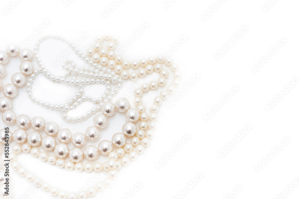 Pearl beads with beads of different sizes. Top view. Isolated Pearl beads with beads of different sizes. Top view. Isolated
