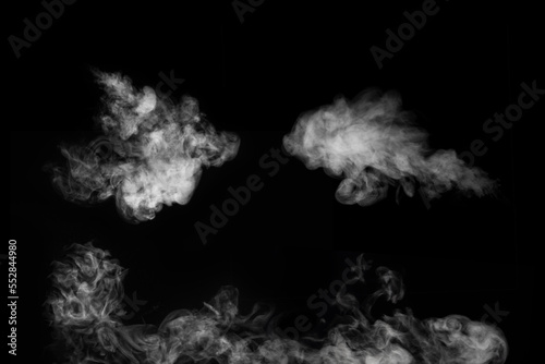 A set of 3 different steam, smoke, gas isolated on a black background. Swirling, writhing smoke to overlay on your photos