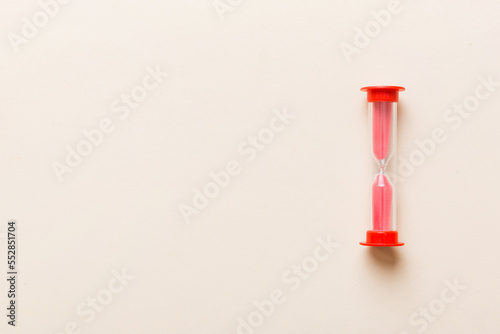 hourglass on the table, sand clock as time passing concept for business deadline, copy space