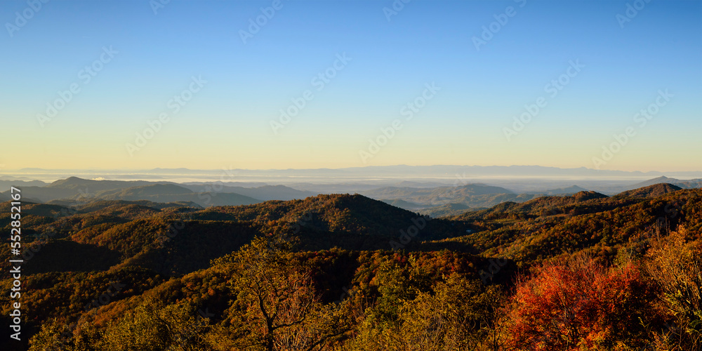 This is a shot from the Thunder Hill Overlook on the Blue Ridge Parkway.  You can see the fall colors of autumn; mist shrouded mountain ranges and the dawn giving way to blue skies.