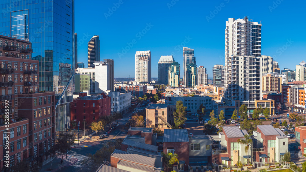 Naklejka premium San Diego city skyline, downtown cityscape of buildings and skyscrapers on a sunny morning with blue sky in Southern California, USA, high view