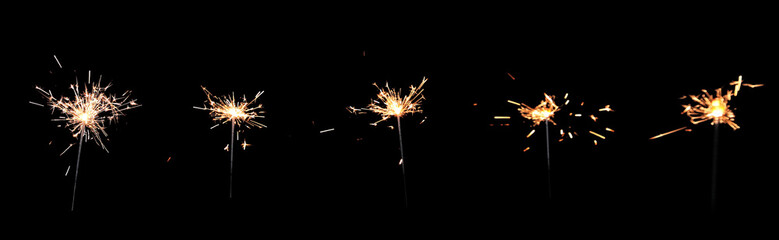 Collage with bright burning sparklers on black background, banner design