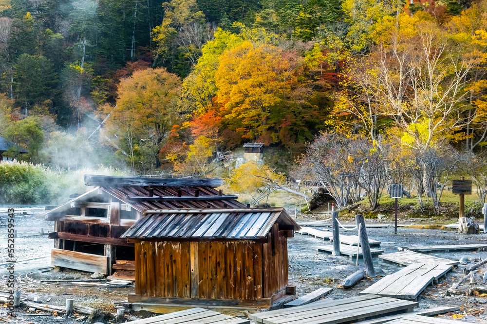 Old wooden onsen bath houses spa buildings in Nikko Japan - obrazy, fototapety, plakaty 