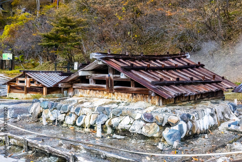Old wooden onsen bath houses spa buildings in Nikko Japan