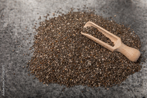 Chia in a wooden spoon close-up.Superfood. Healthy food. Diet. The concept of proper nutrition. antioxidant. Place for text, space for copy.