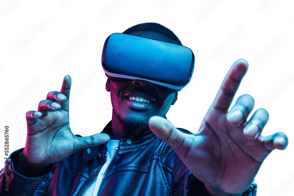 African man wearing virtual reality headset having great fun in metaverse world African man wearing virtual reality headset having great fun in metaverse world