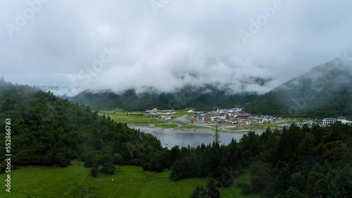 mist-shrouded mountains. High mountain complex. Fog in the morning and evening,Tibet.