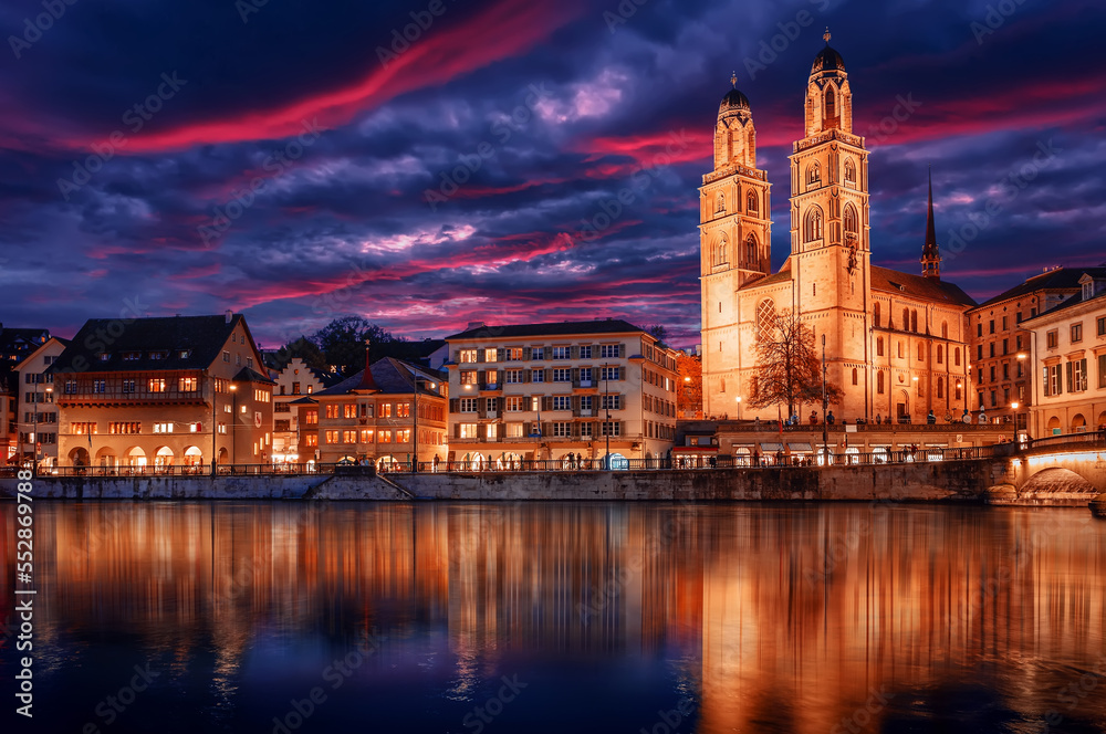 The church Grossmunster. Zurich. Switzerland. Cityscape image of Zurich with colorful sky, during dramatic sunset. Popular travel destination