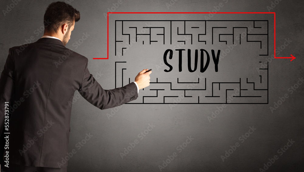 businessman drawing maze concept businessman drawing maze concept