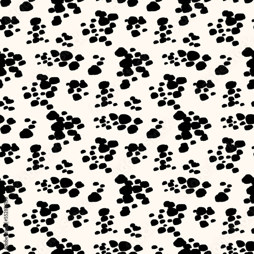 Seamless hand draw polka dots, animal print, fashion style.
