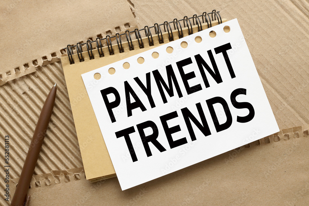 payment trends. two notepads on craft background payment trends. two notepads on craft background