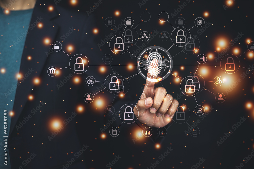 Businessman scan fingerprint login to digital transformation technology Businessman scan fingerprint login to digital transformation technology