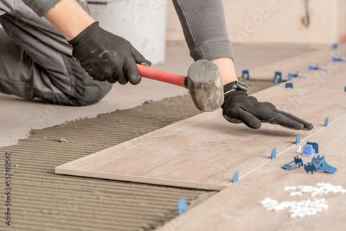 Laying tiles in the bathroom or kitchen