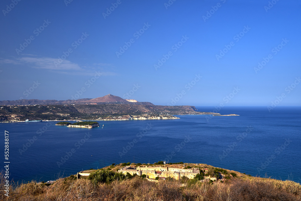 View of Souda Bay and the stone walls of the historic castle on the Greek island of Crete