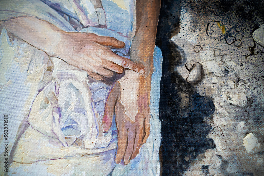 The girl lies in an earthen pit. A clothed woman with red hair. Oil painting portrait with biblical meloncholic subject. Fragment of a painting with hands.