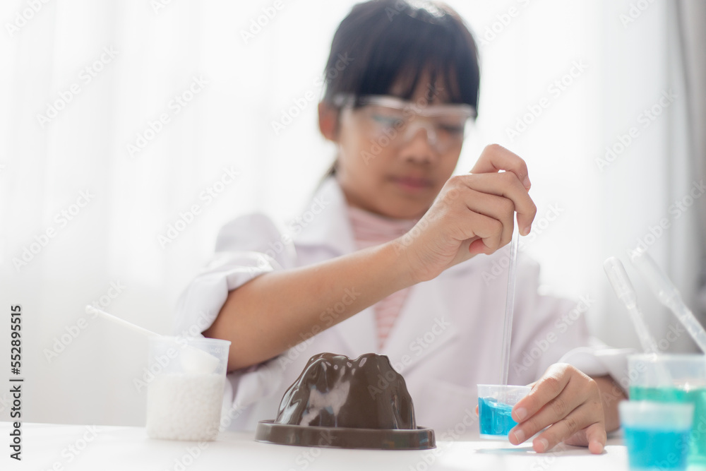 education, science, chemistry and children concept - kids or students with test tube making experiment at school laboratory education, science, chemistry and children concept - kids or students with test tube making experiment at school laboratory