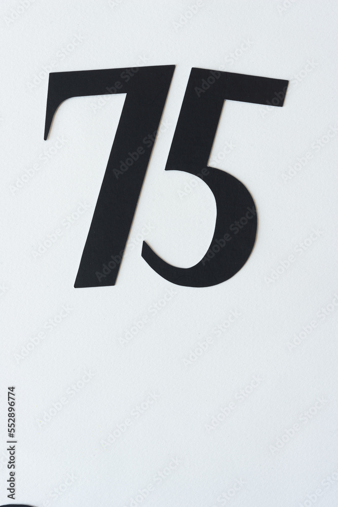 number 75 on blank paper number 75 on blank paper
