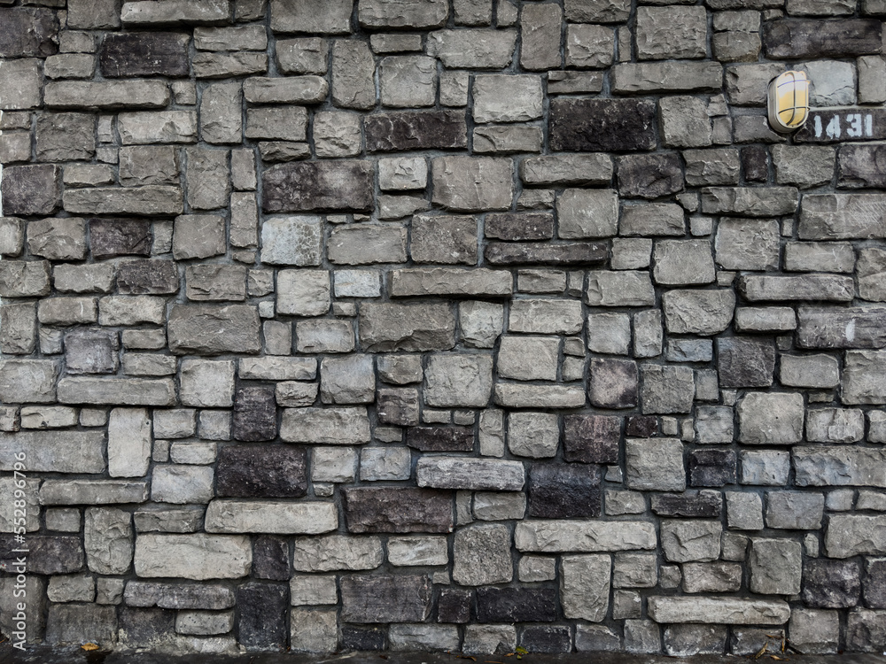 Fototapeta premium Brick stone wall background outdoor photo