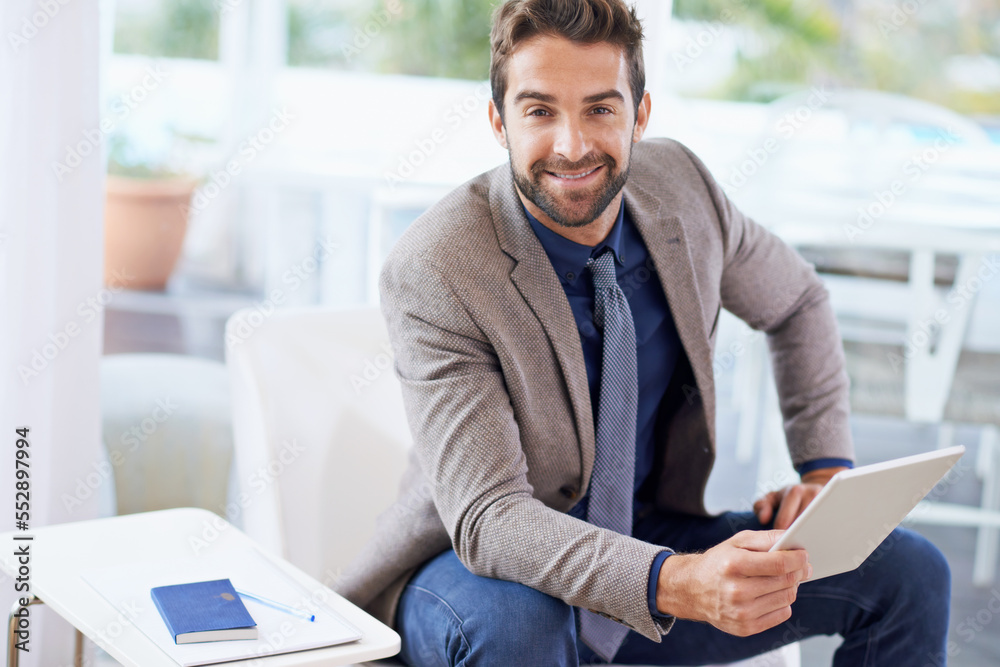 Stop dreaming start doing. Shot of a businessman using his digital tablet. Stop dreaming start doing. Shot of a businessman using his digital tablet.