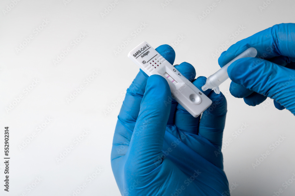 Positive test result by using rapid test device for COVID-19. Positive test result by using rapid test device for COVID-19.